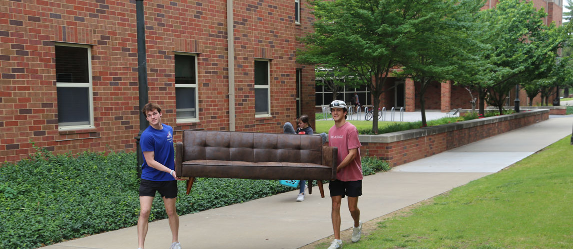 Students moving out of the dorms at the University of Arkansas